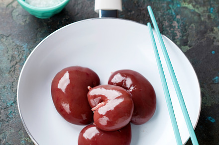 Raw fresh lamb kidneys in a white fr