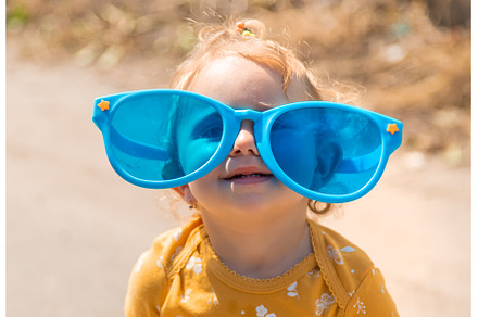 Children enjoy nature in glasses, a Nature Photo by yanadjana
