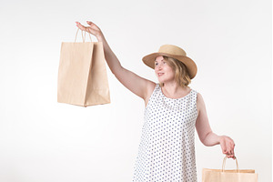 Woman shopper holds craft shopping, a Person Photo by Alexander-Piragis