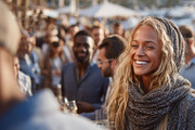 Cheerful woman enjoying a social gathering with diverse people outdoors, a Person Photo by AS photostudio (Thumbnail 2 of 2)