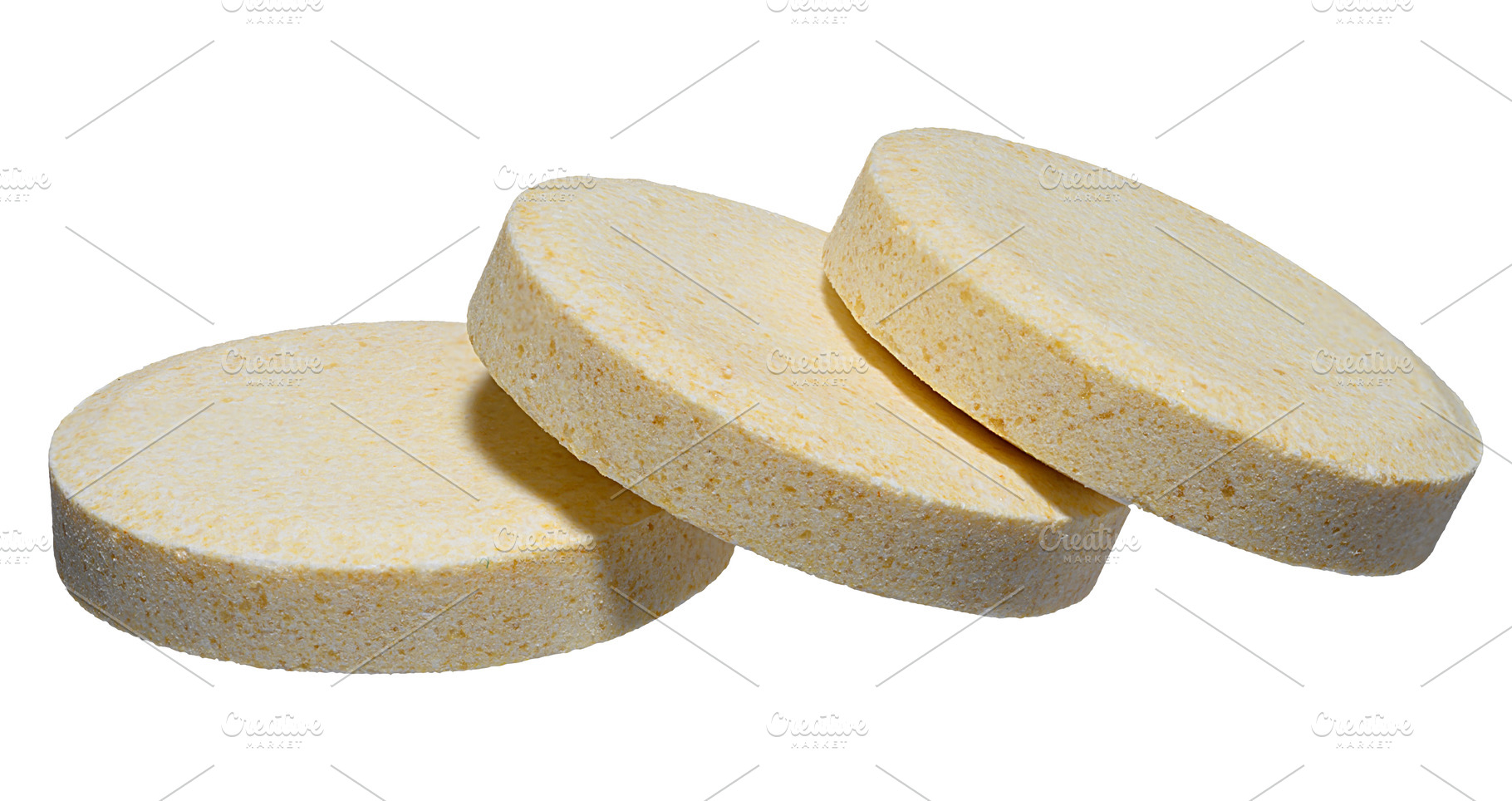 Stack of large round pills of light yellow color, isolated backg, a Health & Medical Photo by ndanko