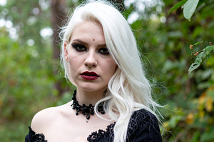 beautiful young goth woman outdoor, AI generated, a Photo by WorldOfPhotos