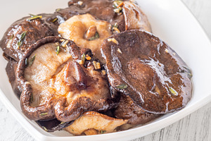 Crispy fried garlic thyme shiitake, a Food & Drink Photo by Alexander Prokopenko