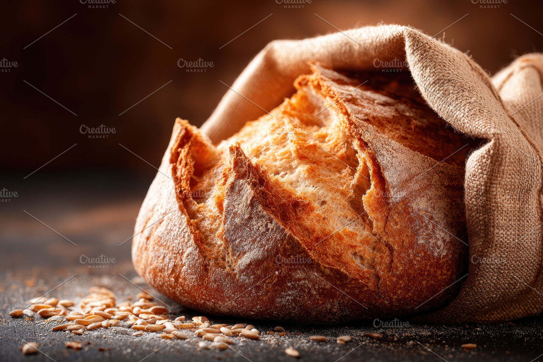 Rustic bread loaf with cloth and grains, a Food & Drink Photo by AlyaAnd