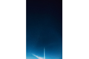 Airplane contrail cutting through a, a Transportation Photo by Our Amazing World