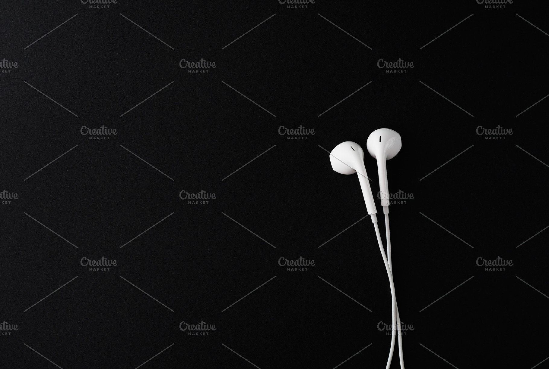Top view of White Earbuds or, a Technology Photo by Klever Level Studio