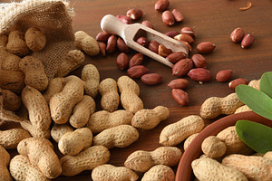 Detail of peanut on rustic wooden table, a Food & Drink Photo by Davizro's Market