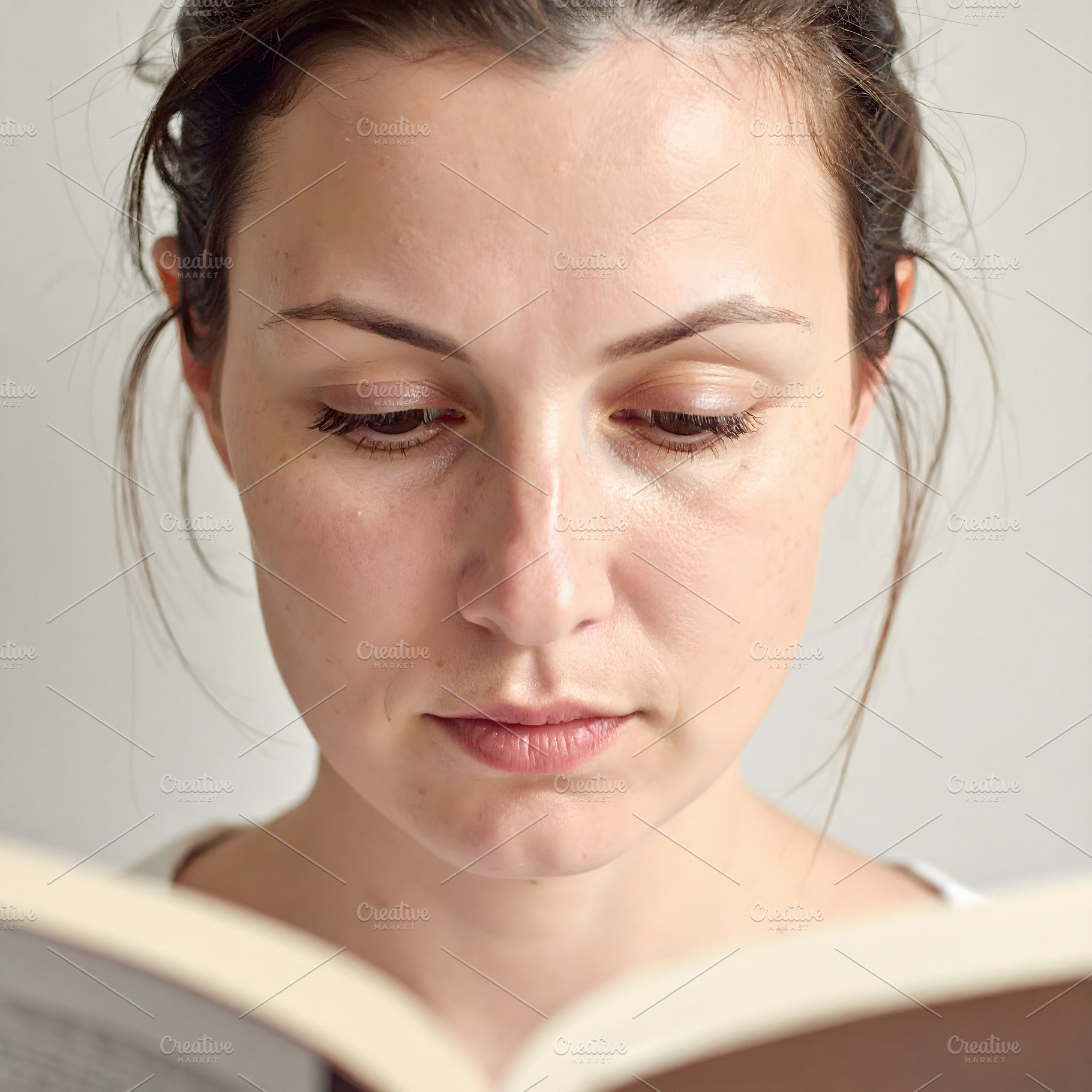 Woman reading book portrait with calm reflection, a Person Photo by GoodGoods