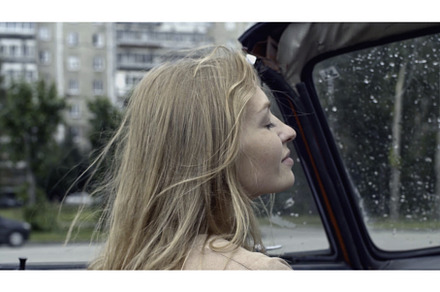 Young woman on passenger seat in a, a Person Photo by Media Whale Stock