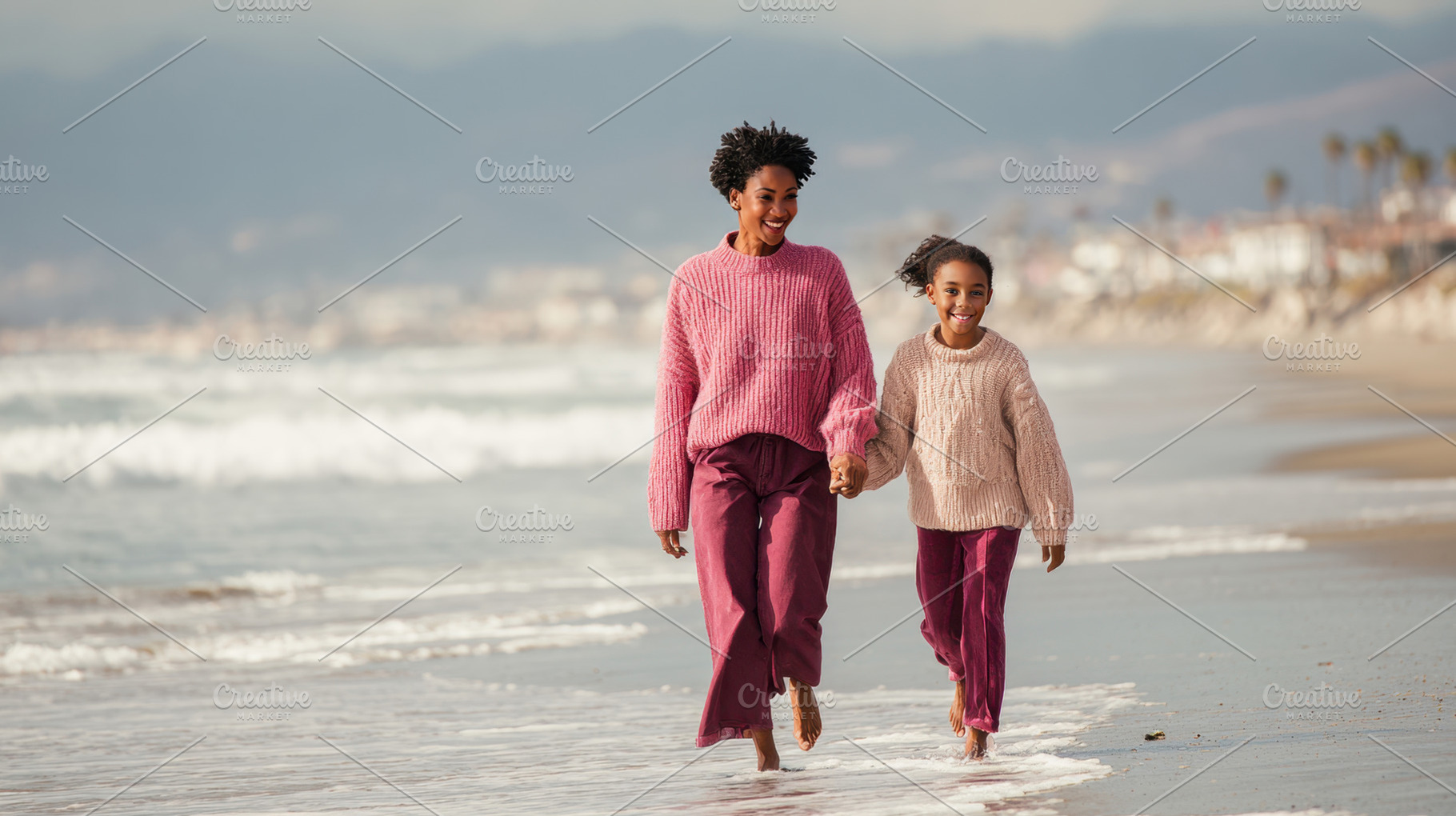 Mom and daughter on beach, a Photo by Beautiful things