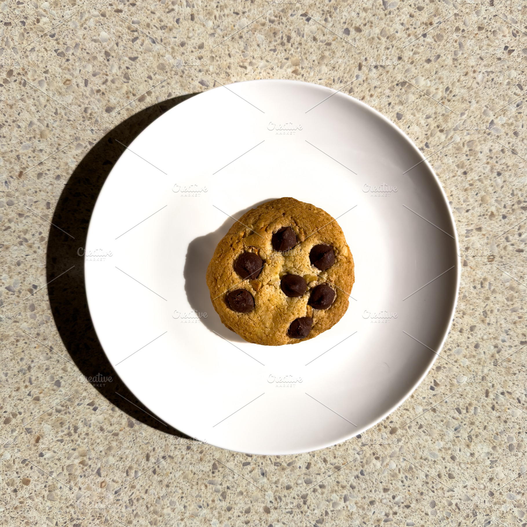 Chocolate Chip Cookie On Plate High Contrast, a Food & Drink Photo by THP Creative