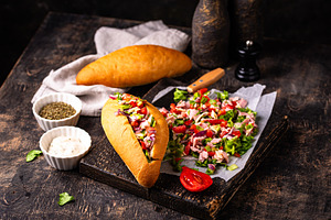 Chopped Italian sandwich, a Food & Drink Photo by Yulia Furman