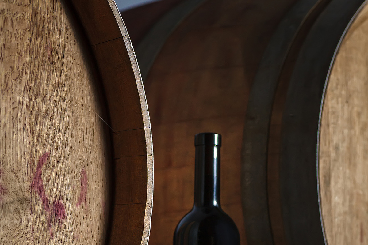 Wine Bottle on a Barrel Label Mockup, a Packaging Mockup by Hidden Hallow (Photo 2 of 2)