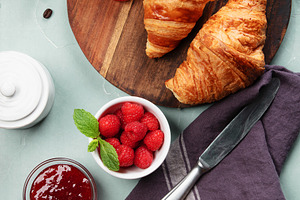 Fresh Croissants on Wooden Board with Butter and Knife, a Food & Drink Photo by Natalia Klenova's Shop