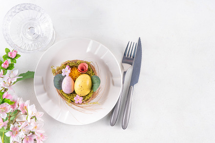 Easter holiday table setting with cutlery, a Holiday Photo by Rimma