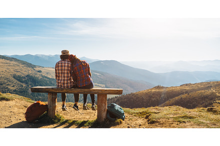 Couple of Hikers With Backpacks in