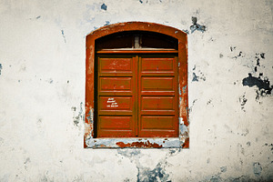 Old red window stock photo containing decay and decal