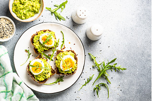 Whole grain bread with avocado and, a Food & Drink Photo by Nadia-nb