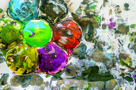 Splash watercolors drops on white background. Abstract colorful, an Abstract Photo by Casanowe-studio