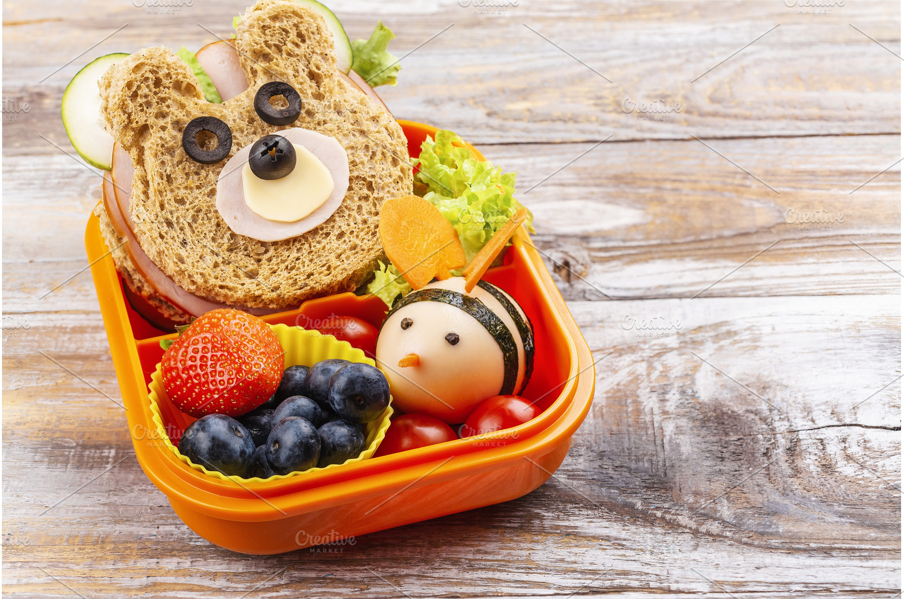 Lunch box with funny bear sandwich, a Food & Drink Photo by Ekaterina_Markelova