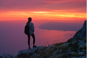 Women hiker with backpack standing, a Person Photo by den-belitsky
