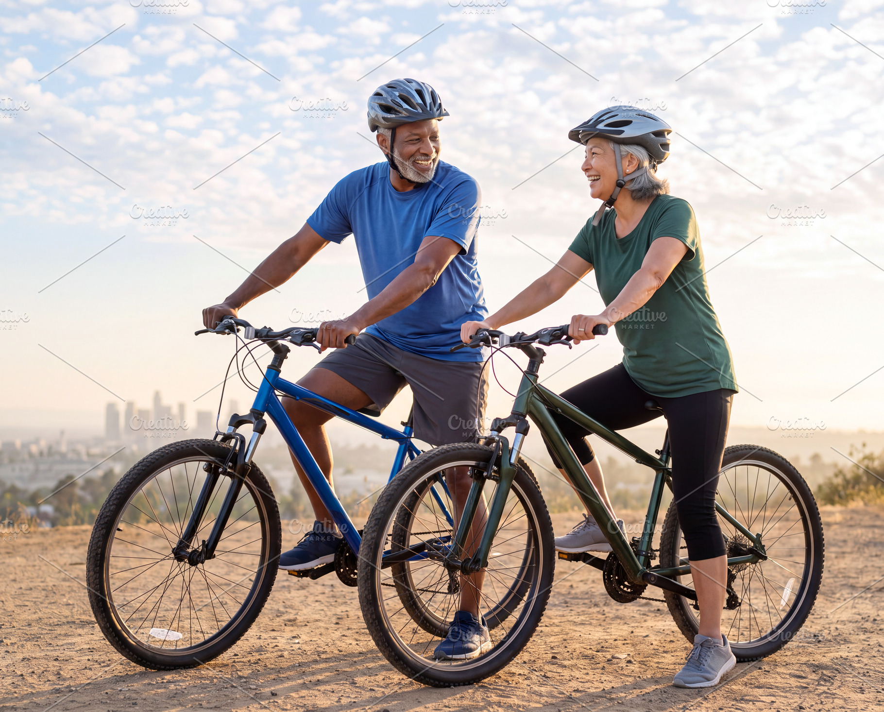 Multiracial senior couple riding bicycles together on outdoor tr, a Sports & Recreation Photo by Volff