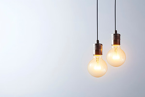 hanging lit light bulbs, generative AI, a Photo by Nito