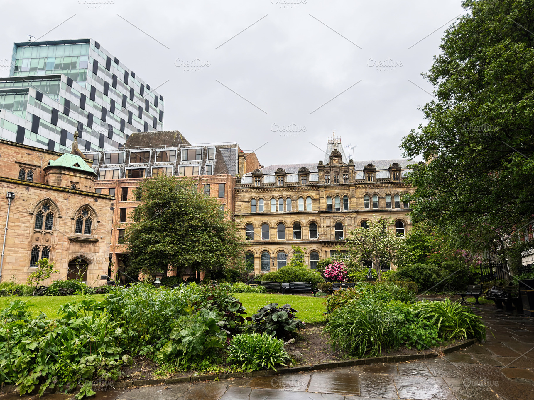 Historic sandstone buildings and a modern glass tower overlookin, a Photo by AS photostudio