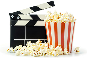 Black clapper board and bucket of popcorn on white background, a Food & Drink Photo by AlyaAnd