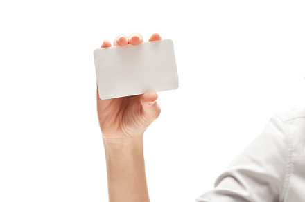 Hand holding blank business card containing blank, white, and isolated, a Business Photo by 1981 Rustic studio kan