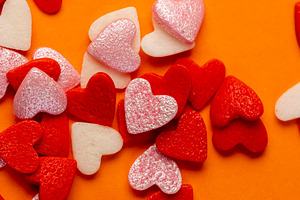 sweet sugar candies in the shape of hearts, a Photo by rsoollAI