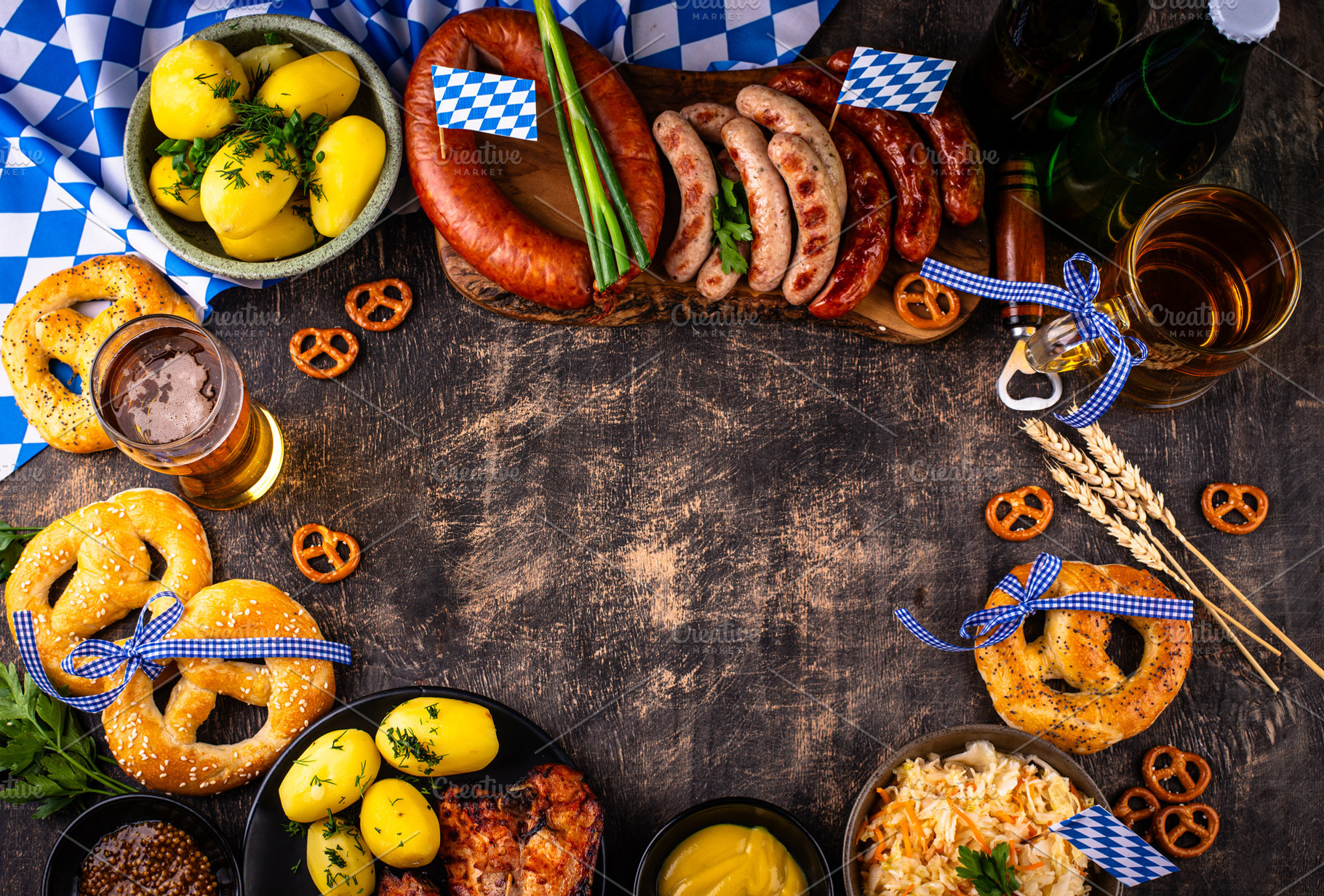 Oktoberfest beer, pretzel, sausages, a Food & Drink Photo by Yulia Furman