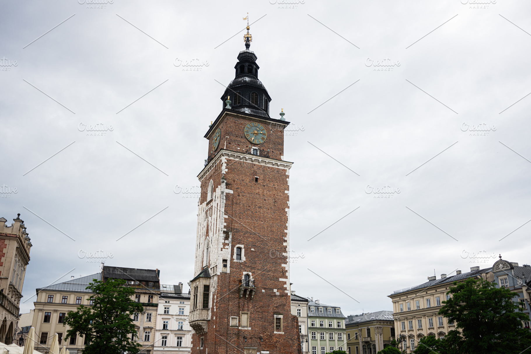 Historical town hall tower in Krakow, Poland, with striking architecture, a Photo by AS photostudio
