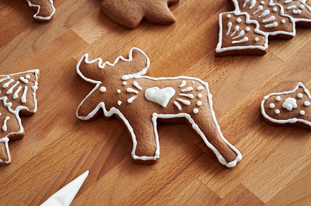 Decoration of homemade gingerbread Christmas cookies with icing, a Food & Drink Photo by Madeleine Steinbach