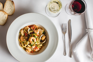 Dinner with seafood pasta and drinks, a Photo by Beautiful things