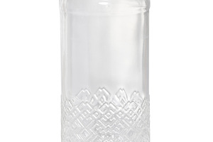 Empty transparent glass bottle with a relief pattern and a red s, a Food & Drink Photo by ndanko