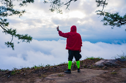 traveler or man waiting sunrise and mist at Phu kradueng nationa, a Nature Photo by Casanowe-studio