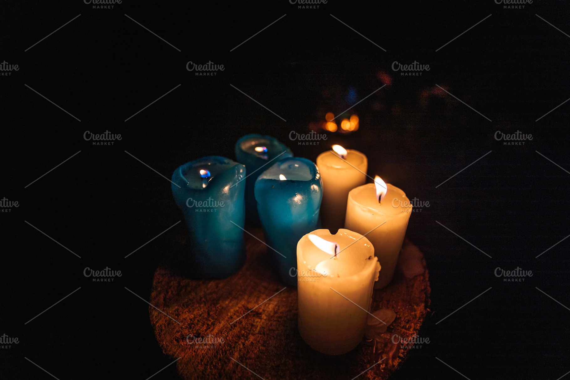 Lit Candles on Wooden Surface in Dark Atmosphere, an Abstract Photo by Red Hot Chili Pepper Shop