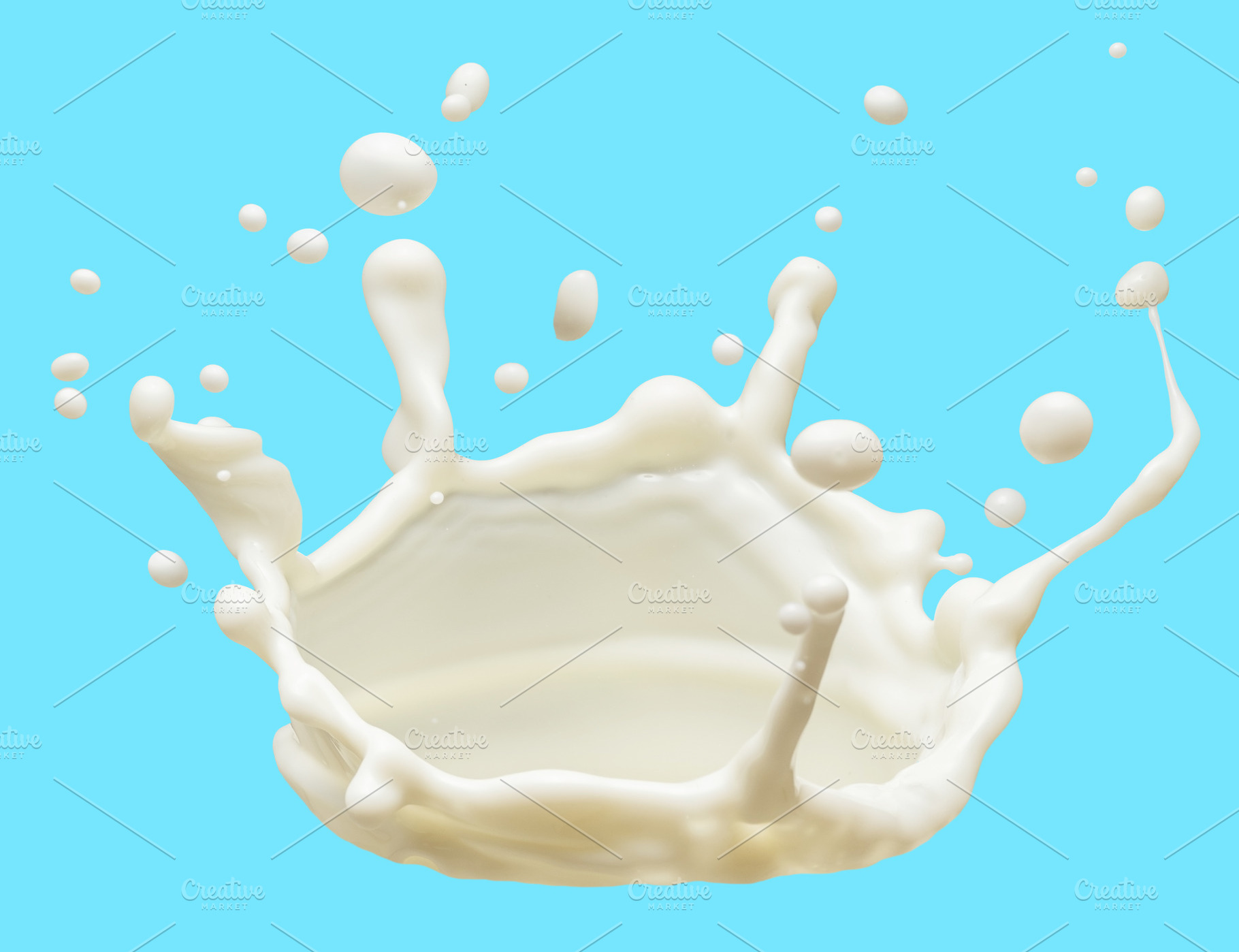 Milk splash (crown) isolated, a Food & Drink Photo by Volff