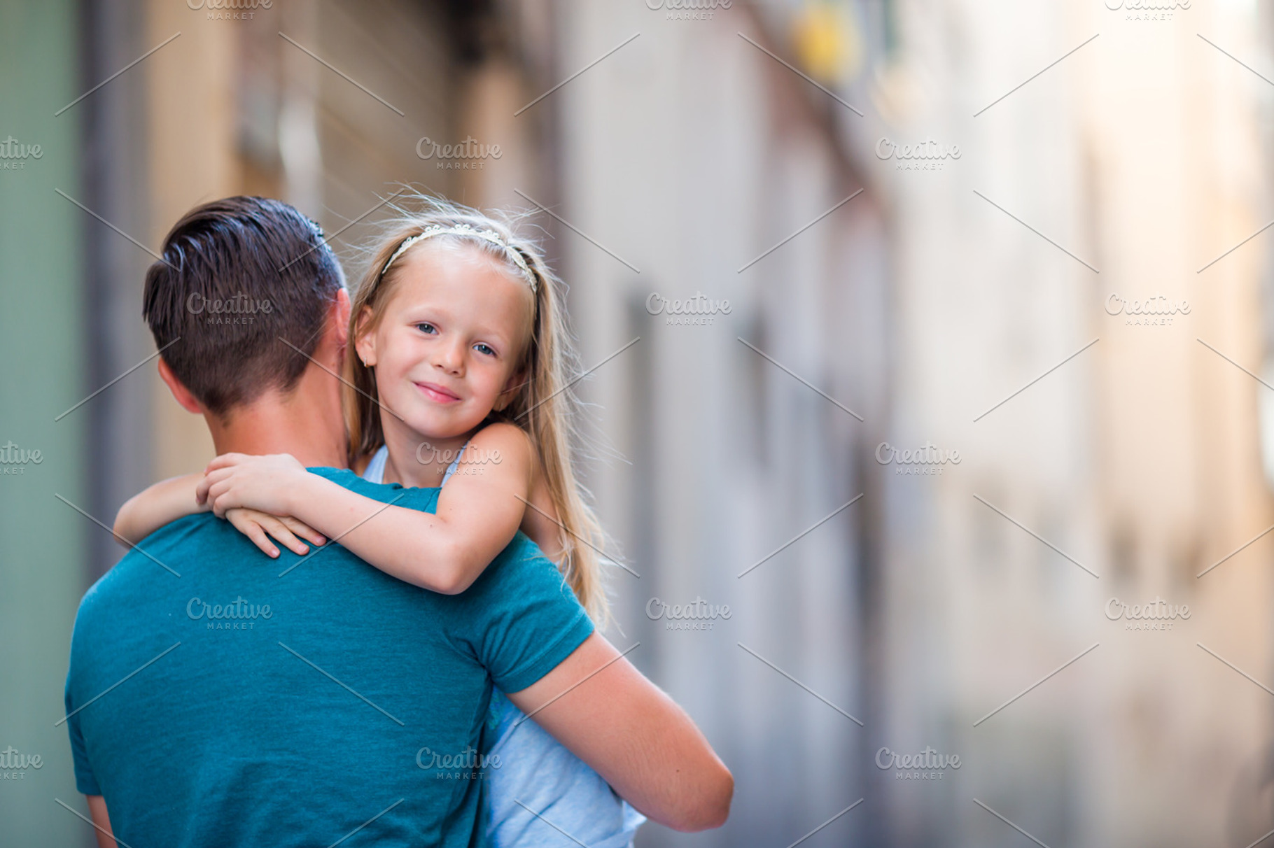 Family in europe happy father and little adorable girl in old city during, a Person Photo by travnikovstudio