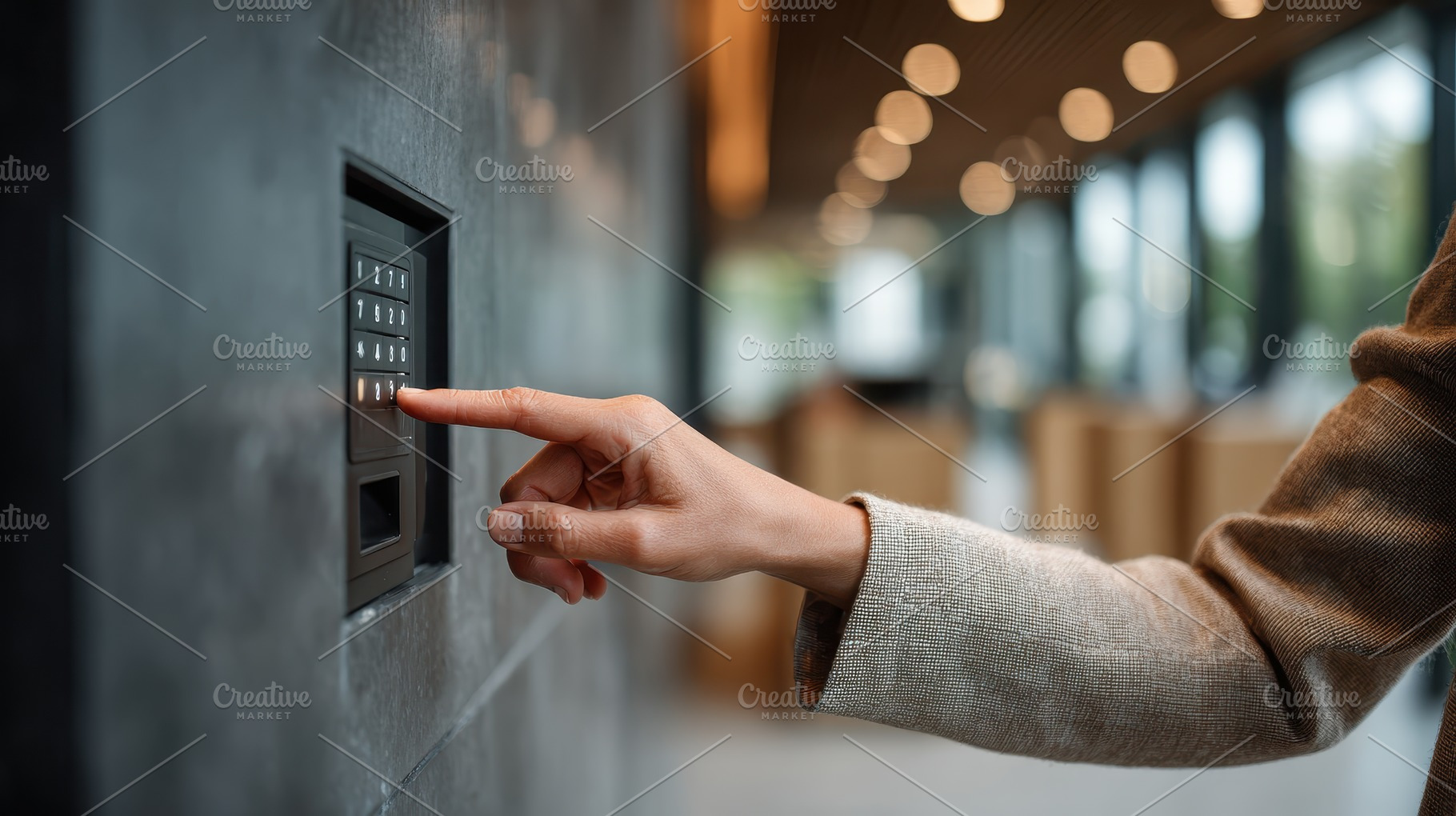 Hand entering security code on keypa, a Photo by Pixeness Studio