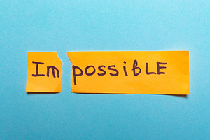 The word impossible is written on ye
