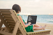 Girl on the Beach with Laptop, a Mac Mockup by UI Kitchen (Thumbnail 5 of 6)