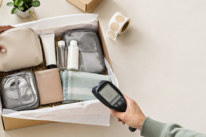 Open box with travel essentials, acc, a Photo by Dvoevnore photos
