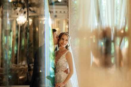 portrait of a bride in a white dress in a bright cafe, a Person Photo by Weddings, People, Travel