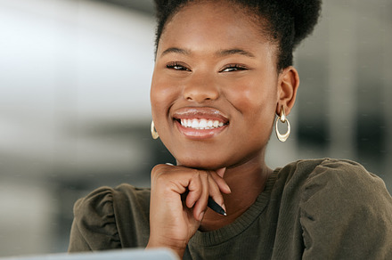 Woman, business and office portrait of a company worker with corporate vision and innovation. Happy black woman smile ready for web management, leadership growth and employee strategy planning, a Photo by Peopleimages.com