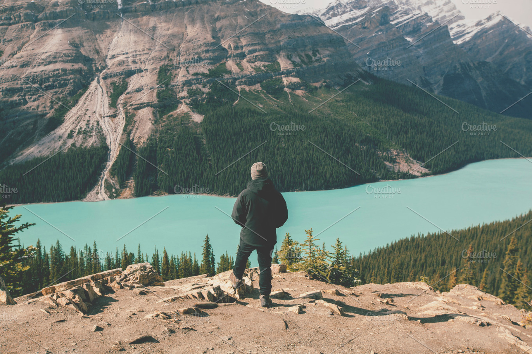 Hiking in the mountains featuring hiking, mountains, and lake, a Person Photo by ZedProMedia