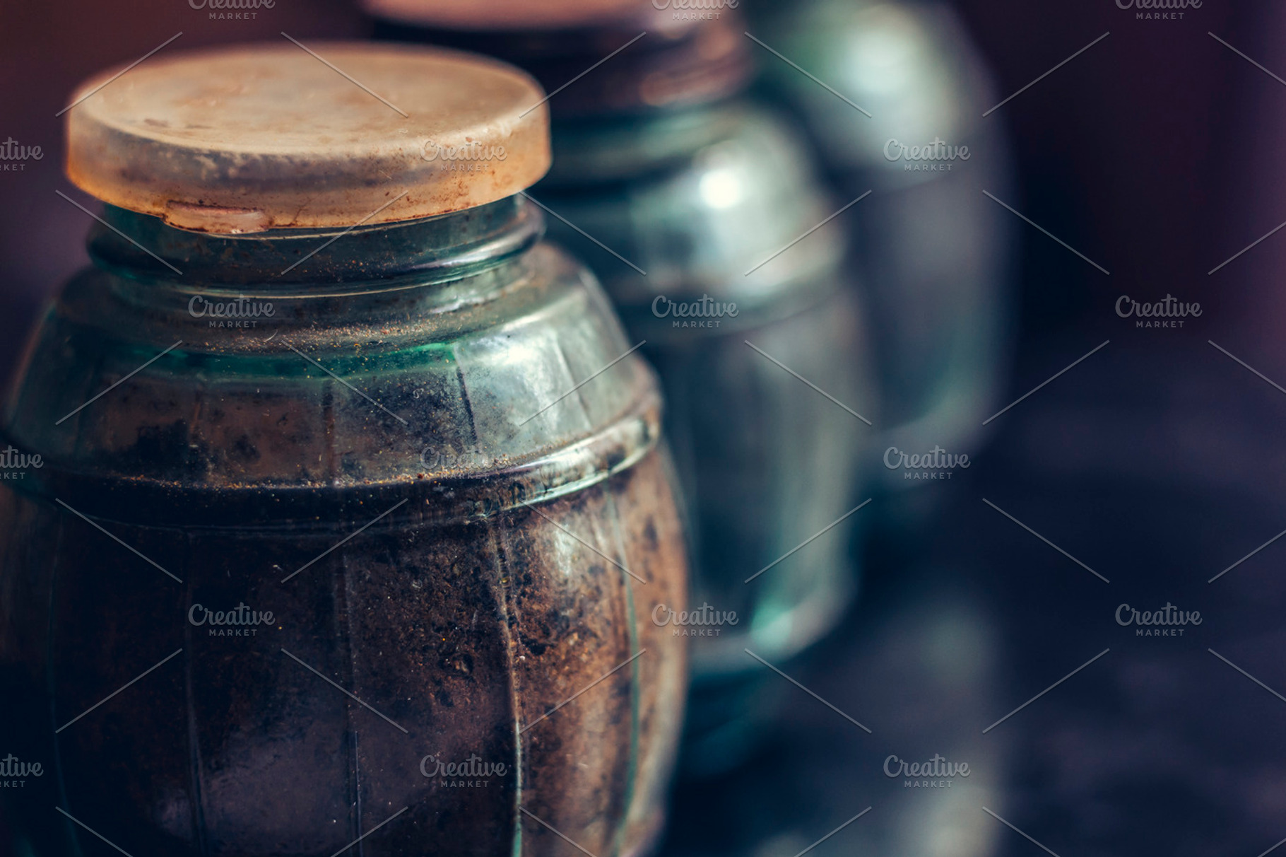 Vintage spice jars containing background, black, and blue, a Food & Drink Photo by LidiaP