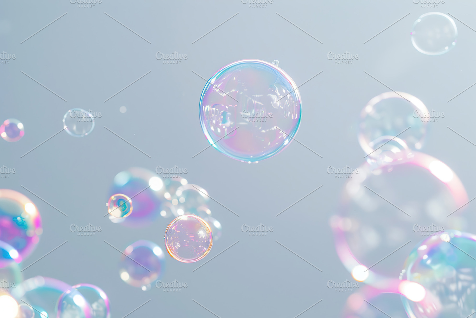 Rainbow soap bubbles on grey background, a Photo by AlyaAnd