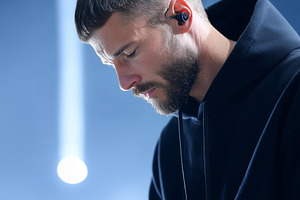 Focused male DJ in black hoodie, an Arts & Entertainment Photo by MistyDay